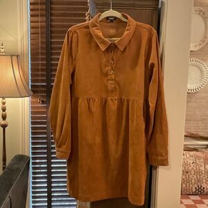 Gorgeous “rust brown” corduroy loose fit dress.  Never worn! Very attractive.